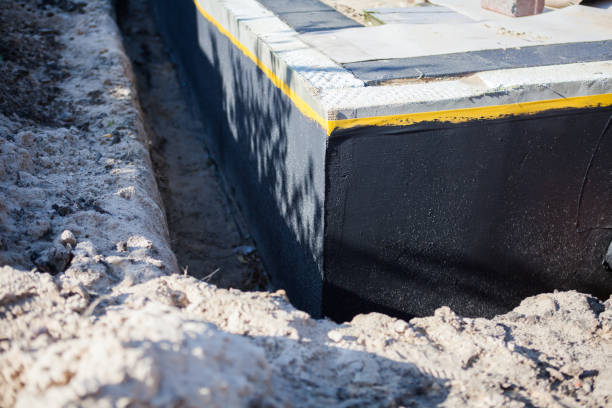 Professional Waterproofing technician working in Harmony, PA